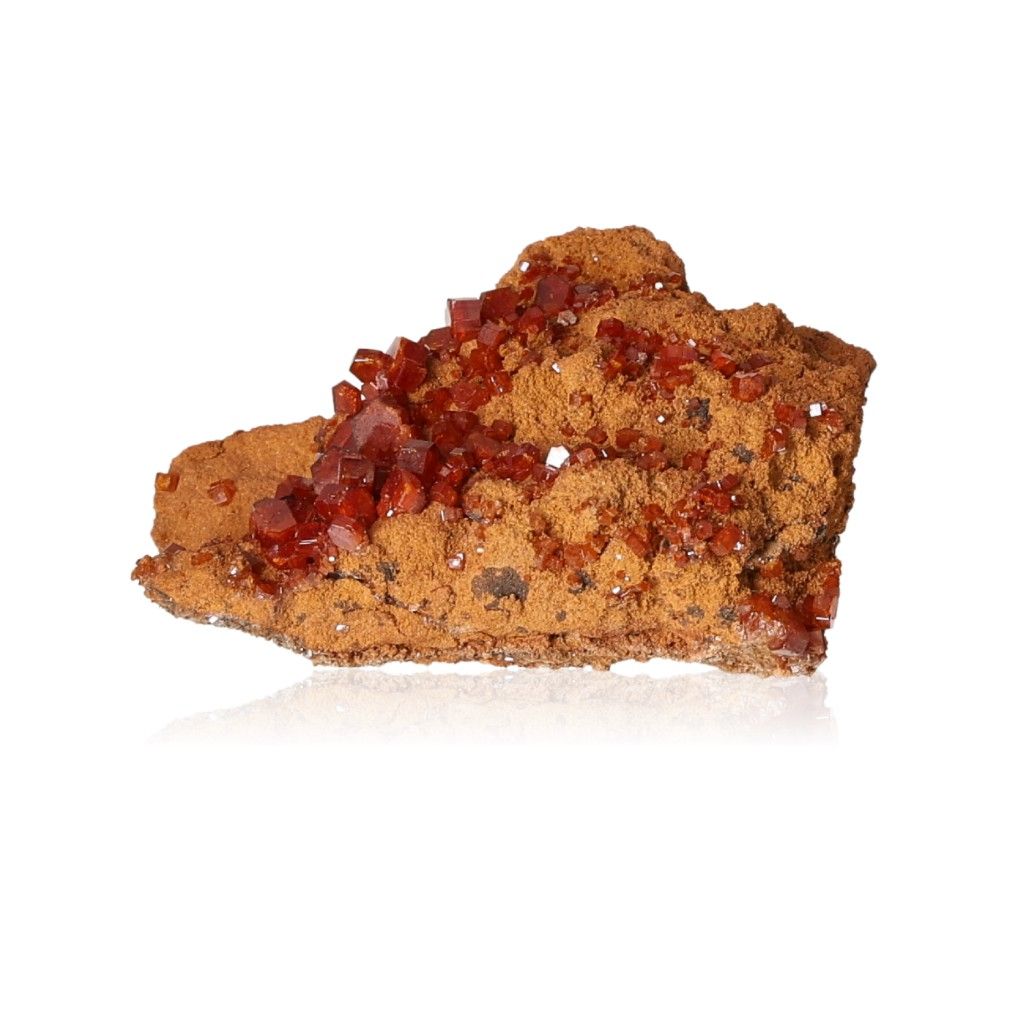 Vanadinite Druze with hexagonal reddish-brown crystals, enhancing focus and personal transformation with geometric patterns.