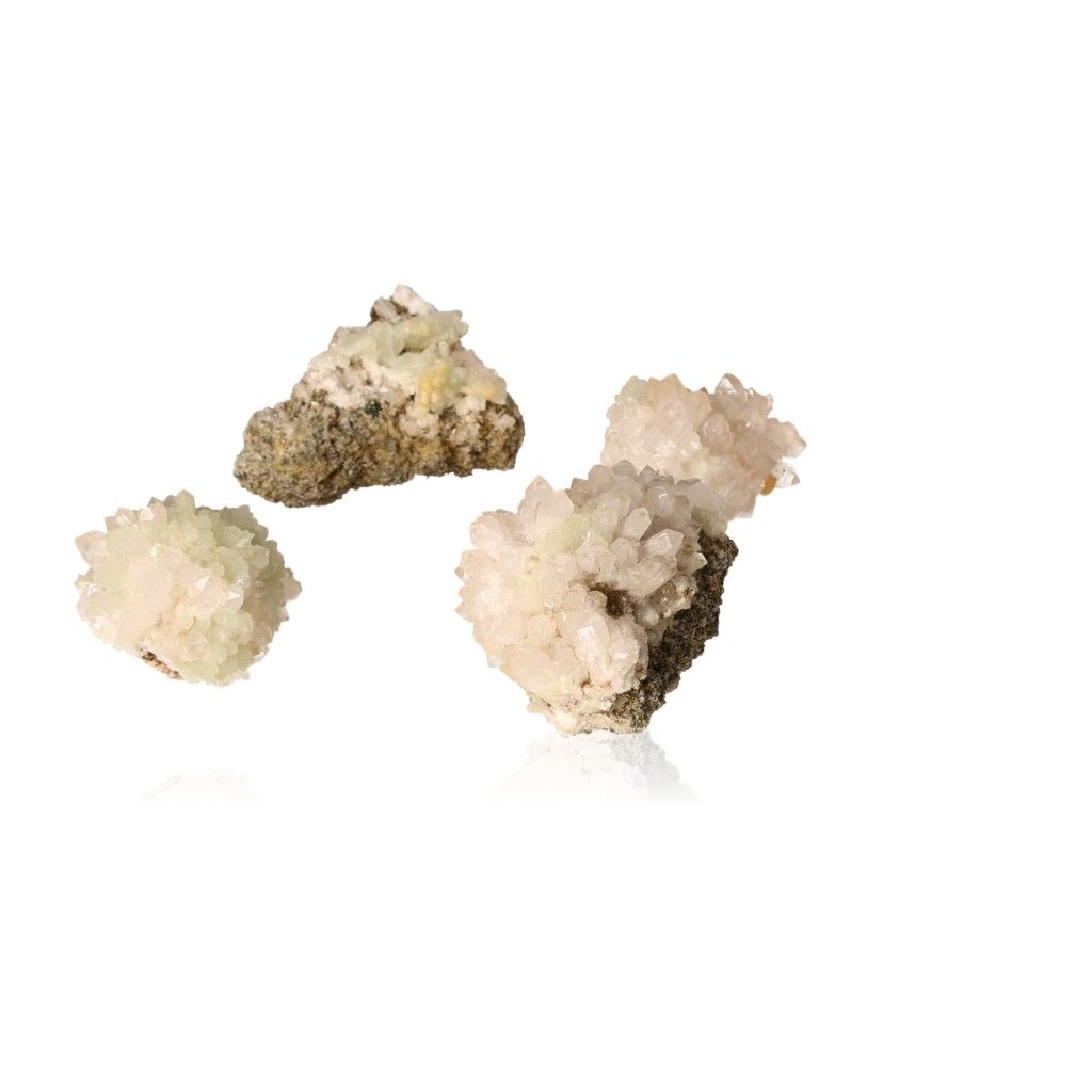 Small Prehnite druzy clusters in pale green and white hues, showcasing natural gemstone formations for spiritual growth and harmony.