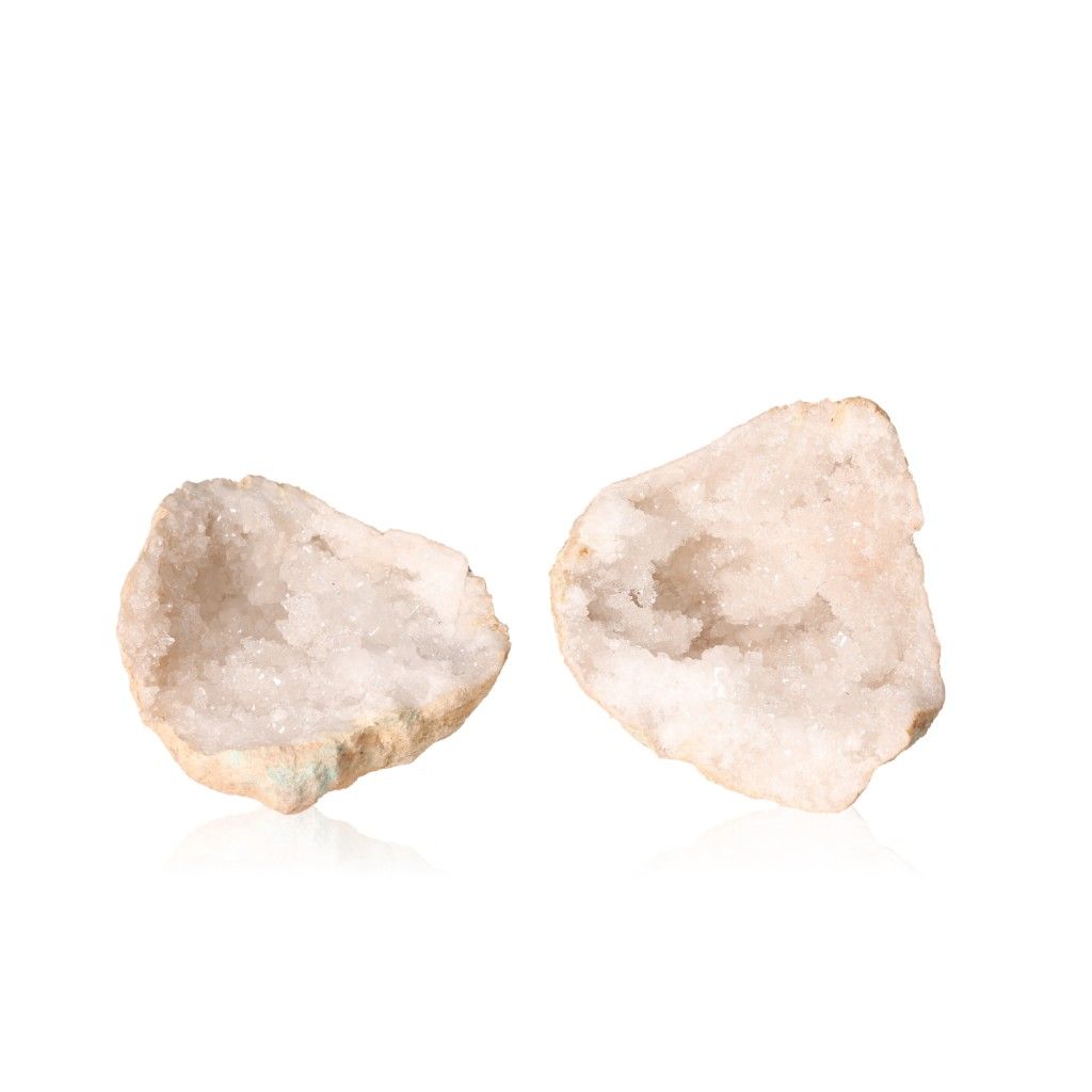 Milky quartz geode with rugged shell and sparkling white crystals, ideal for enhancing tranquility, focus, and positive energy.