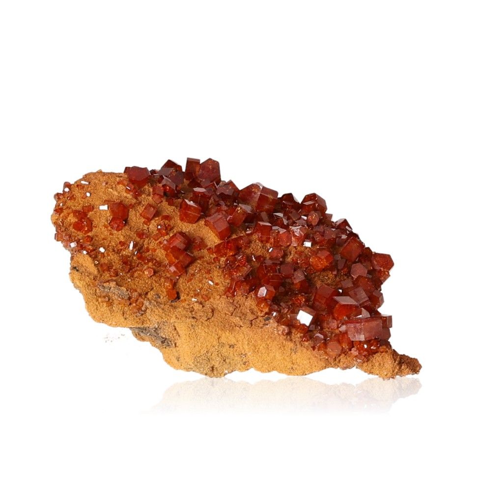 Vanadinite Druze with reddish-brown hexagonal crystals and a glassy surface, enhancing focus and motivation.