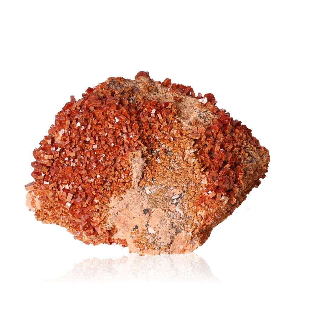 Vanadinite druze crystal showcasing vibrant red-orange hues, enhances focus and motivation for personal transformation and goal achievement.