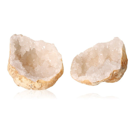 Milky quartz geodes with sparkling white crystals, rugged earthy shell, perfect for energy cleansing and boosting focus.