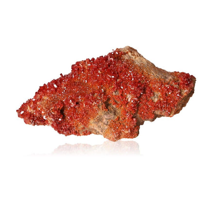 Vanadinite druze stone for enhancing focus, motivation, and personal transformation with vibrant red crystal clusters.