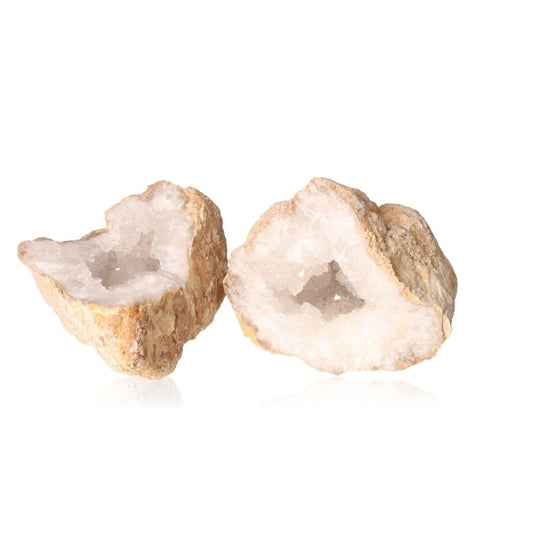 Quartz geode with rugged shell and sparkling cloudy white crystals, known for purifying and amplifying energy, enhancing focus.