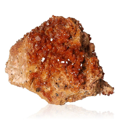 Vanadinite Druze featuring vibrant reddish-brown hexagonal crystals on a rocky base, enhances focus and personal transformation.