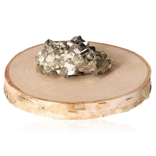 Pyrite druzy crystal on wooden slice, symbolizing courage and inspiration, ideal for motivation and goal setting.