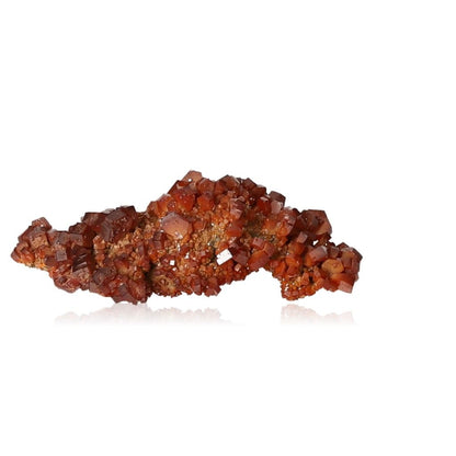 Vanadinite druze features vibrant hexagonal crystals with a glassy surface, known for boosting focus and motivation.