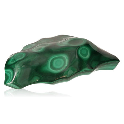 Polished malachite stone with vibrant green patterns displaying natural beauty and soothing energy.