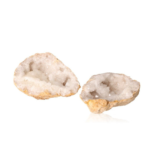 Milky quartz geode split open revealing sparkling white crystals, ideal for energy cleansing and enhancing tranquility.