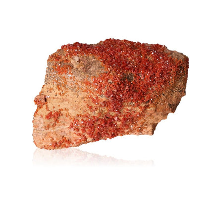 Vanadinite druze crystal, red mineral stone for focus and motivation, energizing for personal transformation and goal achievement.