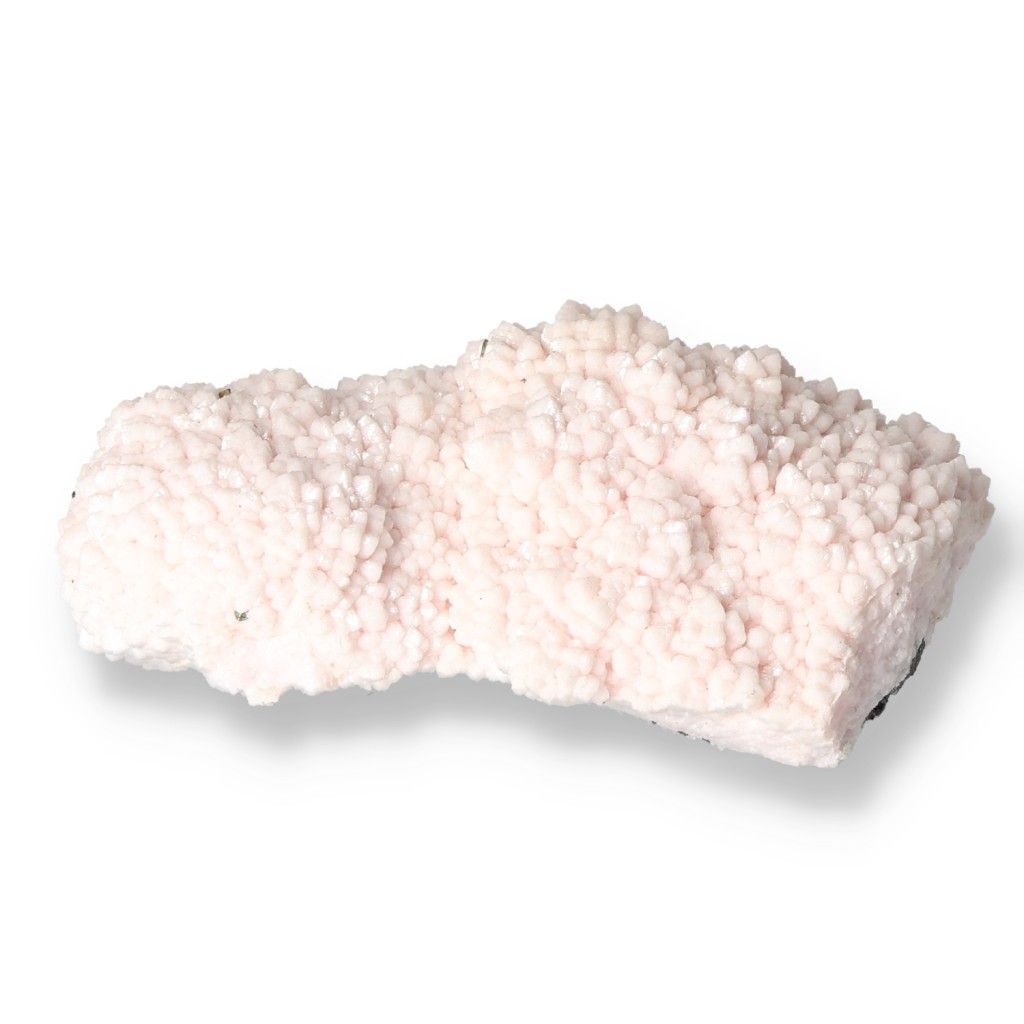 Soft pink Mangano Calcite stone for love and emotional healing, promoting forgiveness and inner peace.