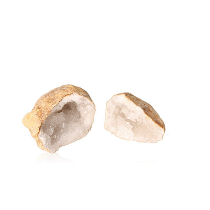 Milky quartz geodes with rugged shell revealing sparkling white crystals, perfect for energy balance and enhancing tranquility.