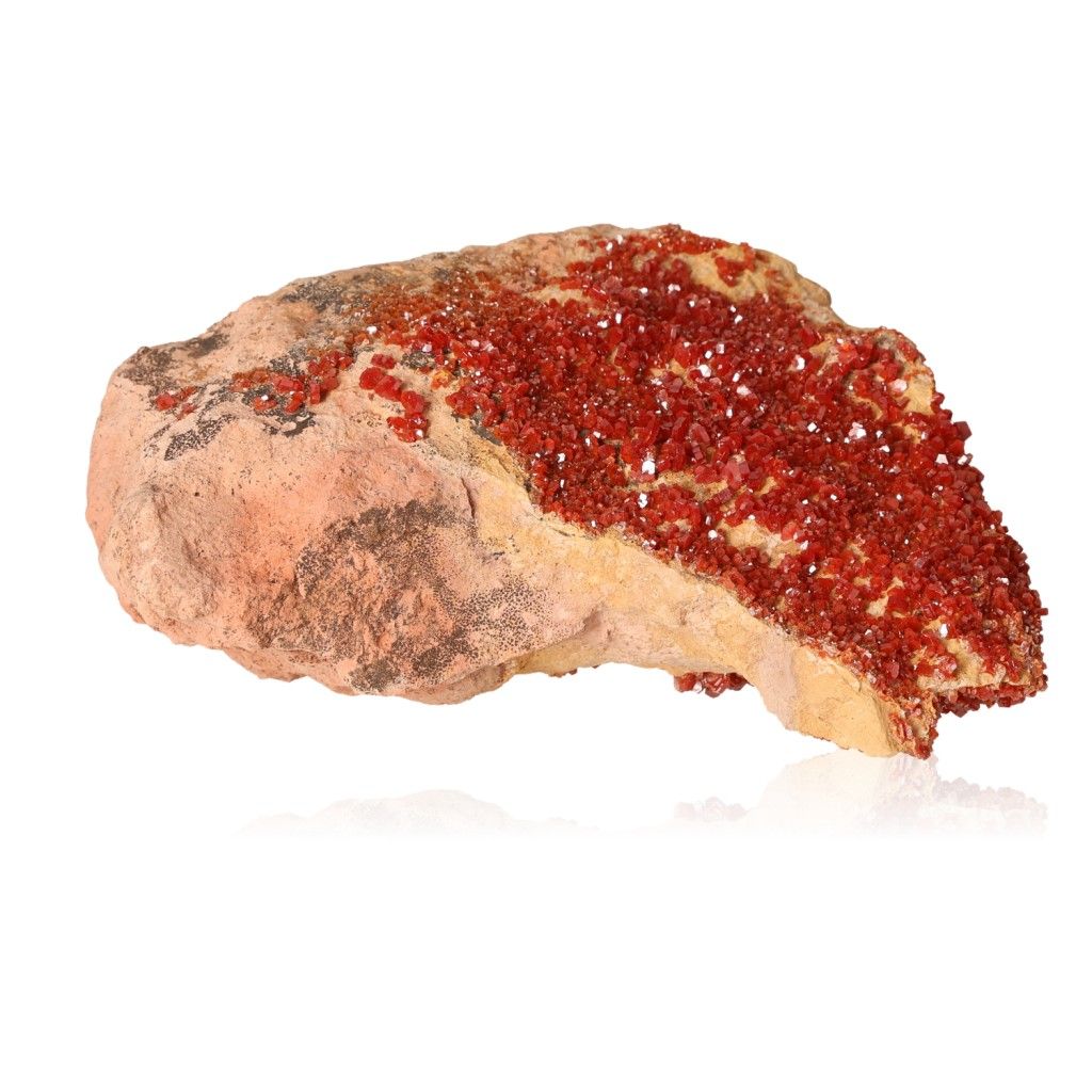 Vanadinite druzy stone with vibrant red crystals for focus and motivation.