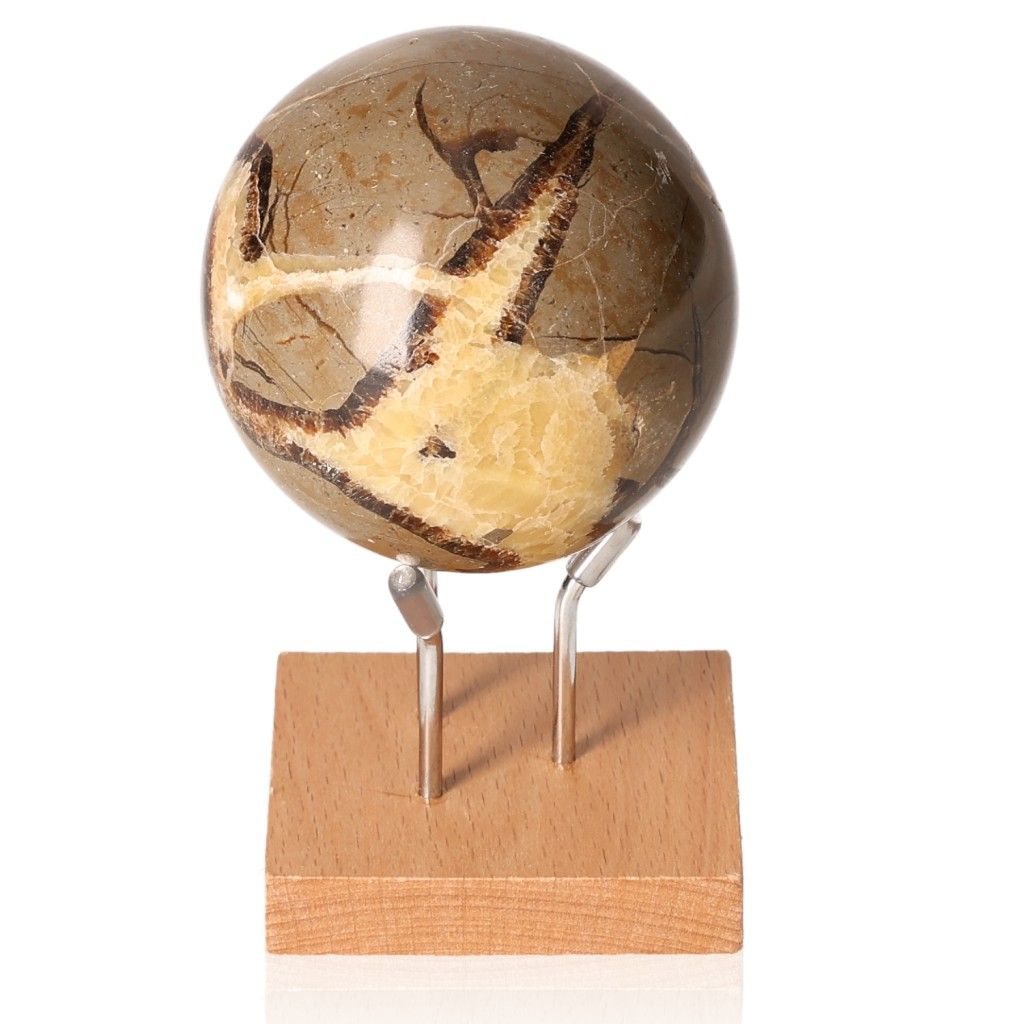 Septarian Sphere on wooden stand showcasing unique stone patterns and colors.