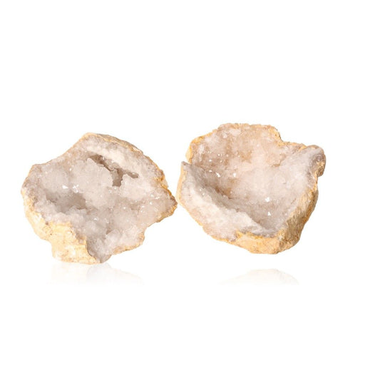 Milky quartz geode with sparkling white crystals, enhancing tranquility and clarity for energy balance and focus.