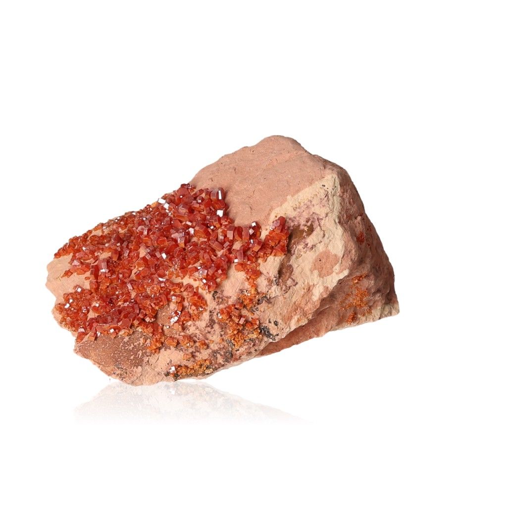 Vanadinite Druze with vibrant reddish-brown hexagonal crystals and glassy surface, enhancing focus and motivation.