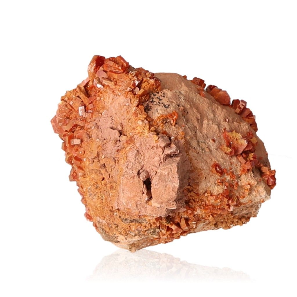 Vanadinite druze mineral specimen with vibrant red-orange crystals for focus and motivation enhancement.