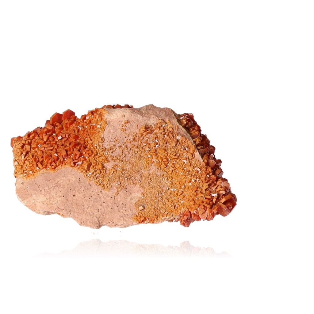 Vanadinite Druze with vibrant hexagonal crystals and glassy surface, enhances focus and motivation with bold reddish-brown tones.