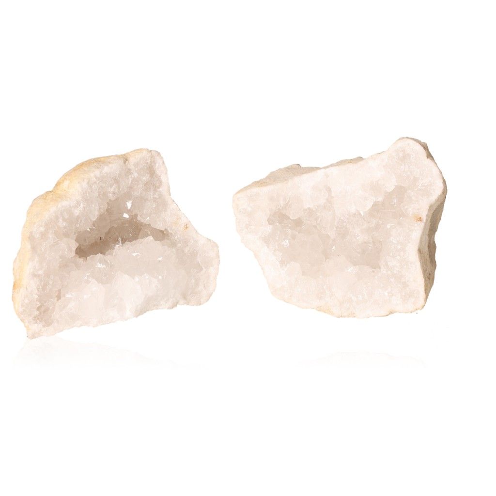 Milky quartz geode with sparkling, cloudy white crystals, known for enhancing tranquility and positive energy in spaces.