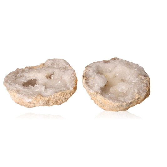 Quartz geode halves with sparkling white crystals and rugged shell, known for enhancing tranquility and balance.