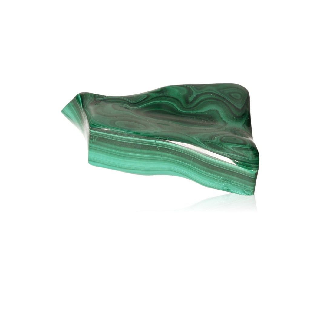 Polished green malachite stone with swirling patterns, symbolizing courage and inner harmony.