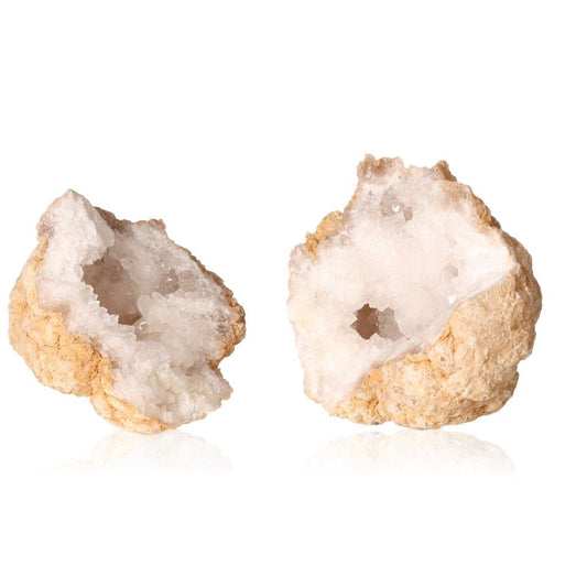 Milky quartz geode with earthy exterior and sparkling white crystals, ideal for energy cleansing and enhancing tranquility and clarity.