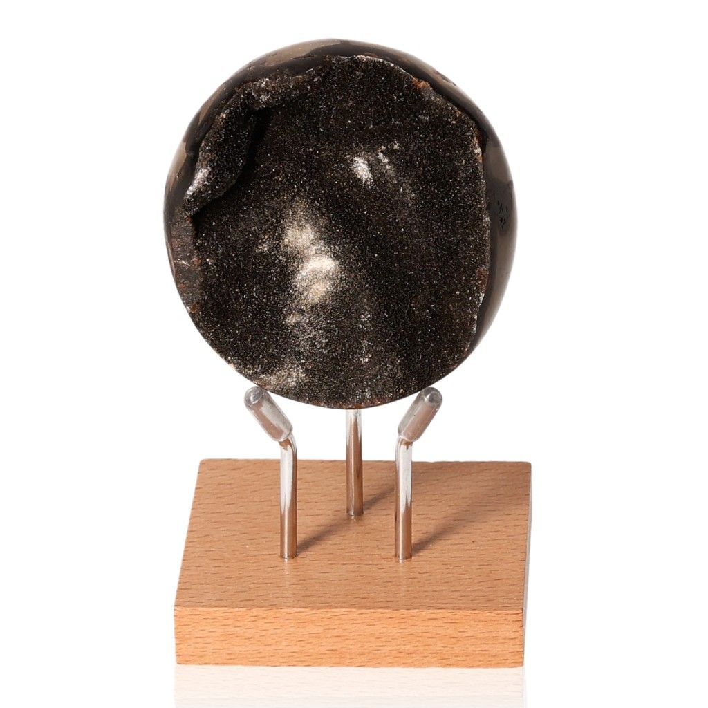 Septarian Dragon Stone displayed on a stand, showcasing its unique mineral texture and shimmering surface.