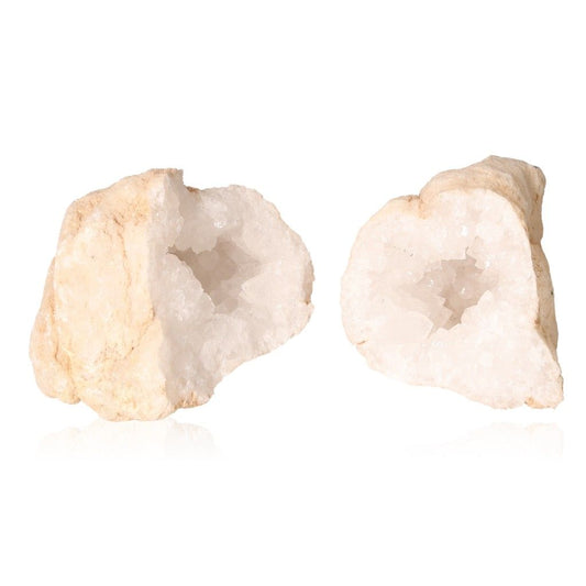 Milky quartz geodes with sparkling white crystals and rugged outer shell, ideal for enhancing tranquility and positive energy.