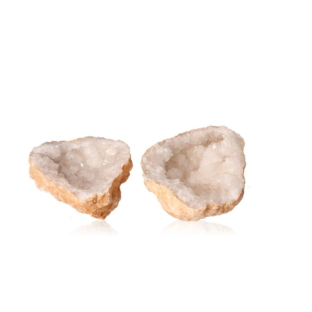 Milky quartz geodes with sparkling white crystals, perfect for enhancing tranquility, energy balance, and focus in any space.