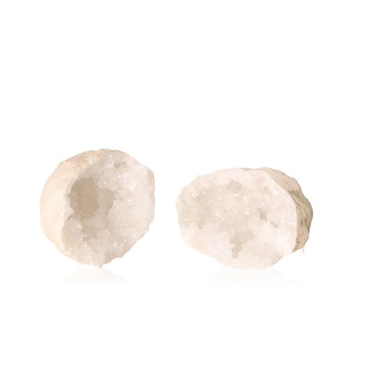 Milky quartz geode with sparkling white crystals, known for purifying energy and enhancing tranquility and clarity.