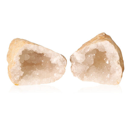 Milky quartz geode halves showcasing sparkling white crystals inside rugged shells for enhancing tranquility and energy balance.