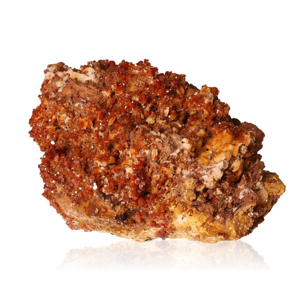 Vanadinite Druze with Barite featuring vibrant reddish-brown crystals and geometric shapes, ideal for enhancing focus and motivation.