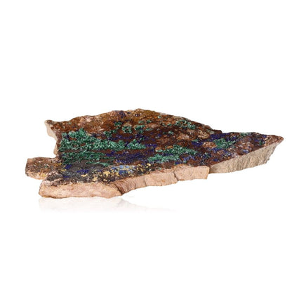 Vibrant malachite slab with green swirls and bands, inspiring courage and optimism for inner harmony and a positive outlook.