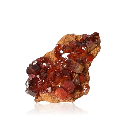 Vanadinite Druze with vibrant hexagonal crystals and glassy surface, enhancing focus and motivation with bold geometric shapes.