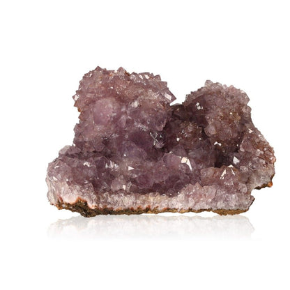 Amethyst druze cluster with deep purple crystals, enhancing space with calming, uplifting energy for meditation and intuition.