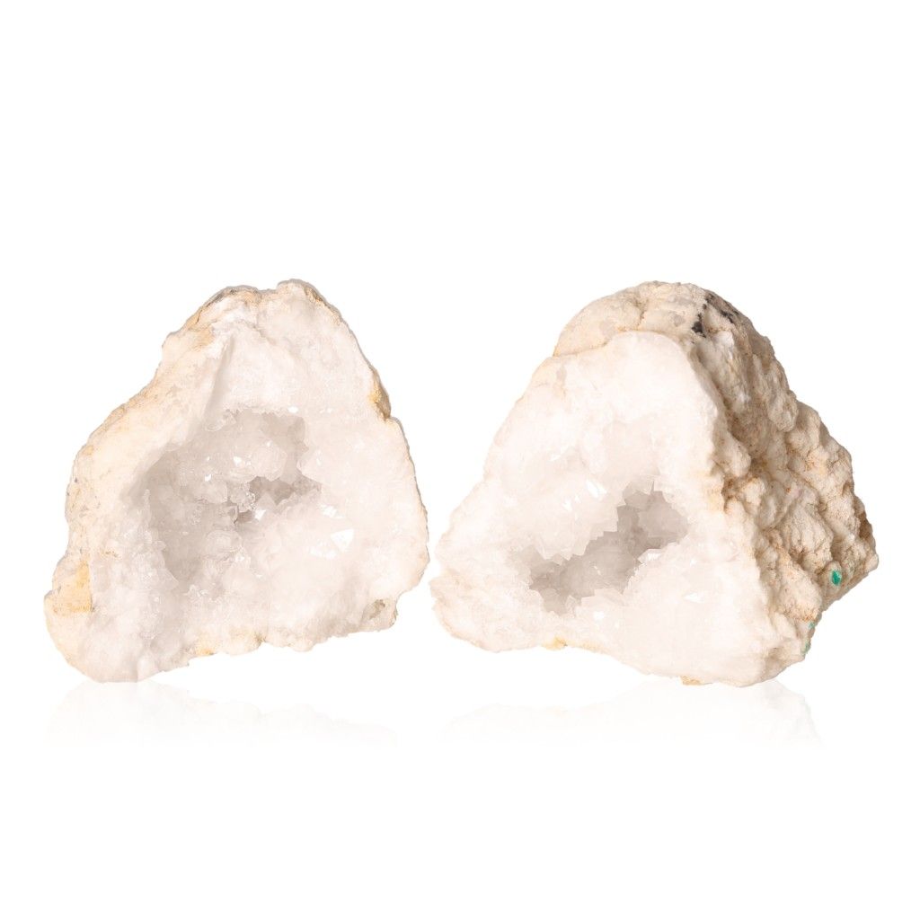 Milky quartz geode with rugged shell and sparkling white crystals for energy balance and focus enhancement.