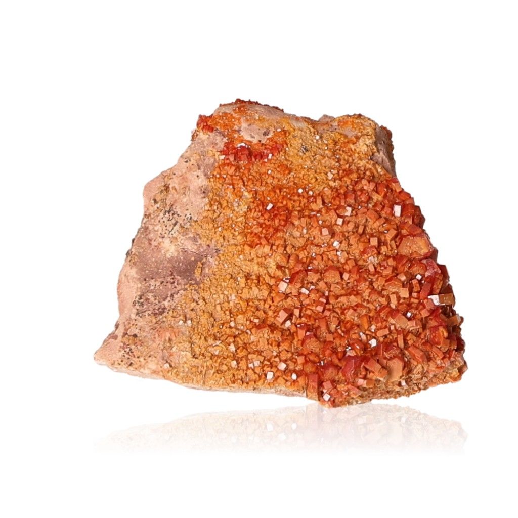 Vanadinite druze stone enhancing focus and motivation with vibrant orange crystals, ideal for personal transformation and resilience.