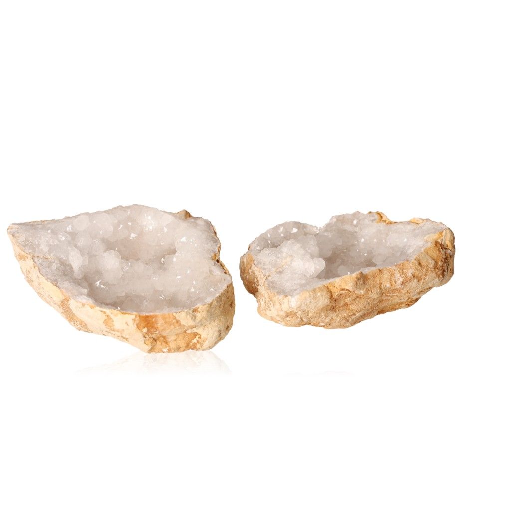 Milky quartz geode with rugged outer shell and sparkling white crystals, known for energy purification and promoting tranquility.