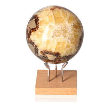 Septarian Sphere, also known as Dragon Stone, showcasing its unique mineral appearance and rich symbolism of power and endurance.