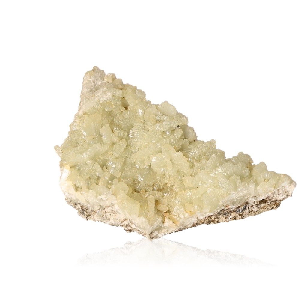 Prehnite druzy gemstone in pale green, showcasing natural crystal formations and promoting inner peace and spiritual growth.