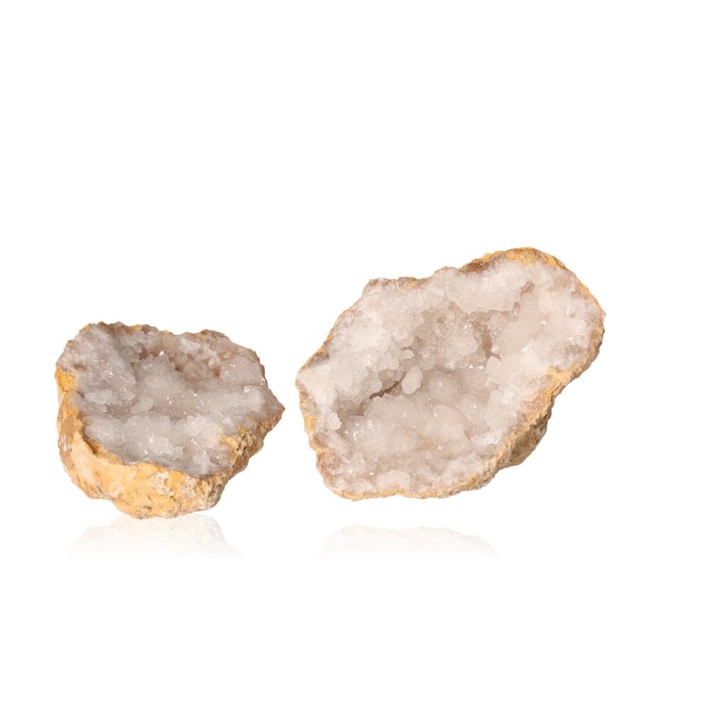 Milky quartz geode with sparkling cloudy white crystals, promoting balance and positive energy, perfect for enhancing tranquility.