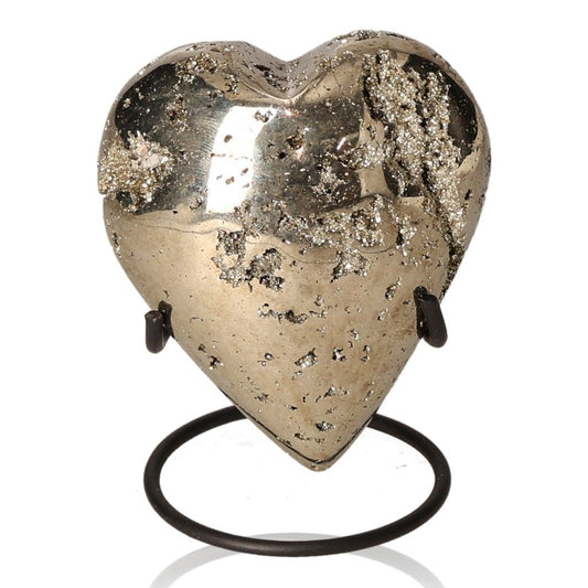 Pyrite heart-shaped stone on stand, symbolizing courage and independence development