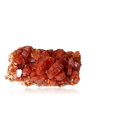 Vanadinite druze featuring vibrant hexagonal crystals with a reddish-brown hue and glassy surface, enhancing focus and motivation.