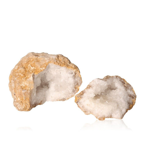 Milky quartz geodes with rugged shells revealing sparkling white crystals, ideal for energy cleansing and promoting tranquility.