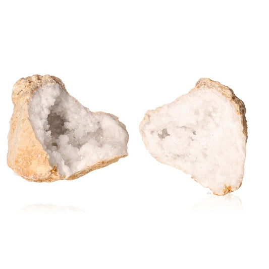 Quartz geode cut open revealing sparkling milky crystals with a rugged outer shell, ideal for enhancing tranquility and positive energy.