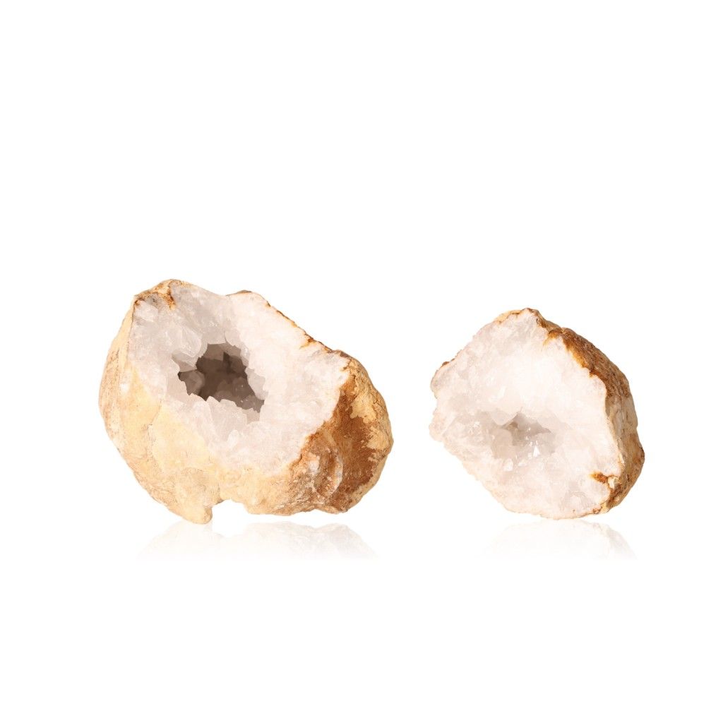 Milky quartz geode with sparkling white crystals and rugged shell, ideal for energy balance and promoting tranquility and focus.