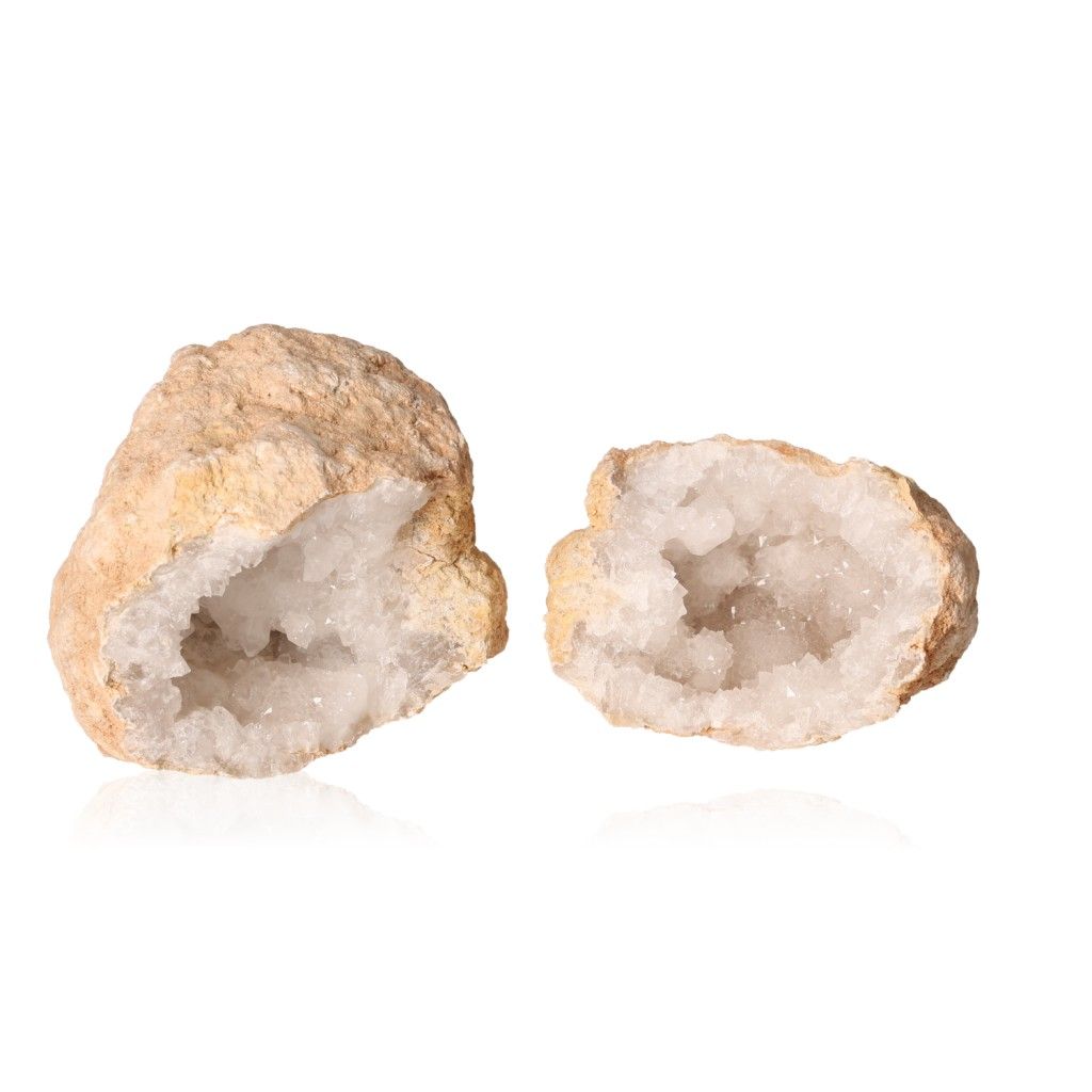 Milky quartz geode split open to reveal sparkling white crystals, known for purifying energy and enhancing focus and tranquility.