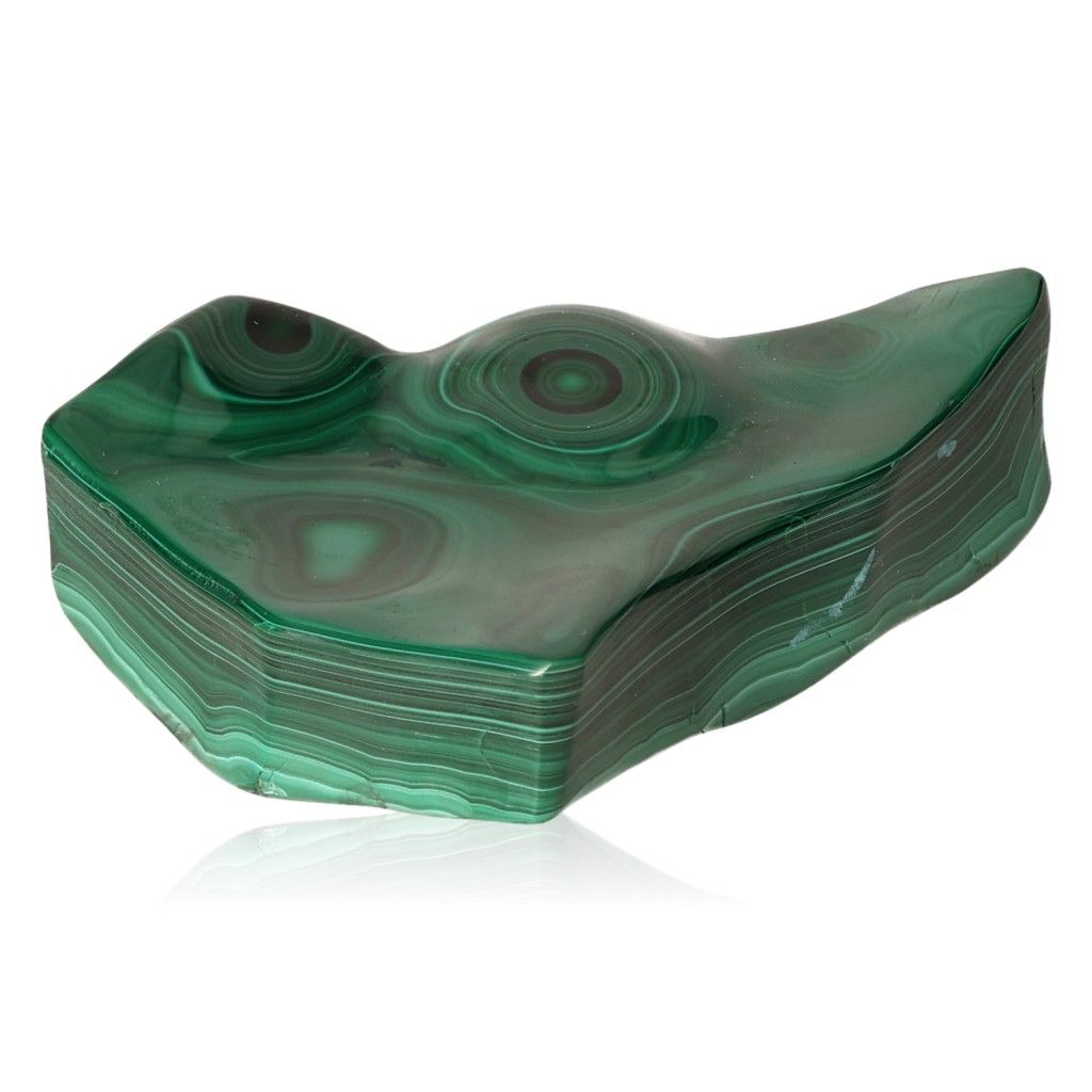 Polished green malachite stone with soothing energy patterns for courage and inner harmony.