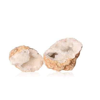 Milky quartz geode with sparkling white crystals, ideal for amplifying energy and promoting tranquility and clarity.