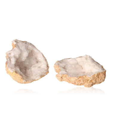 Quartz geode pair showing rugged shell and sparkling cloudy white crystals, ideal for energy balancing and positive vibrations.